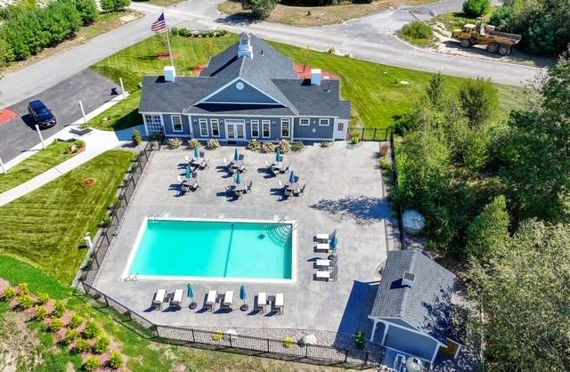 Aerial view of the Trailside Estates 55+ community clubhouse and resort-style pool in Rochester, Massachusetts